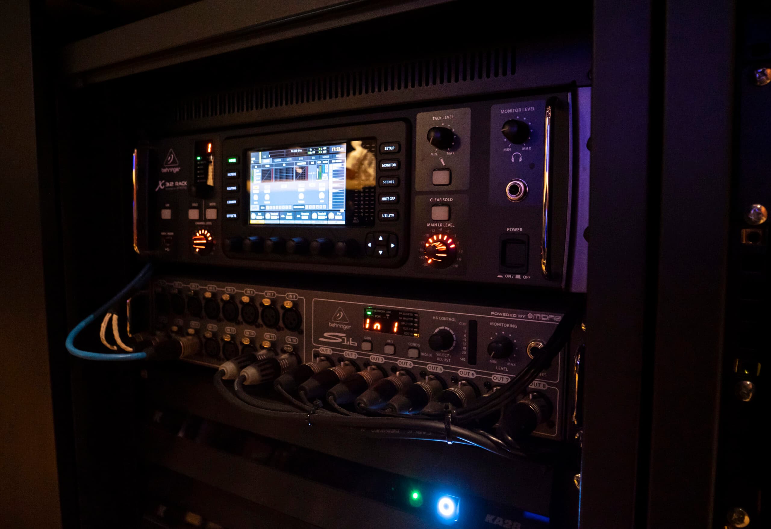 Technician installing slim loudspeakers within a finished interior