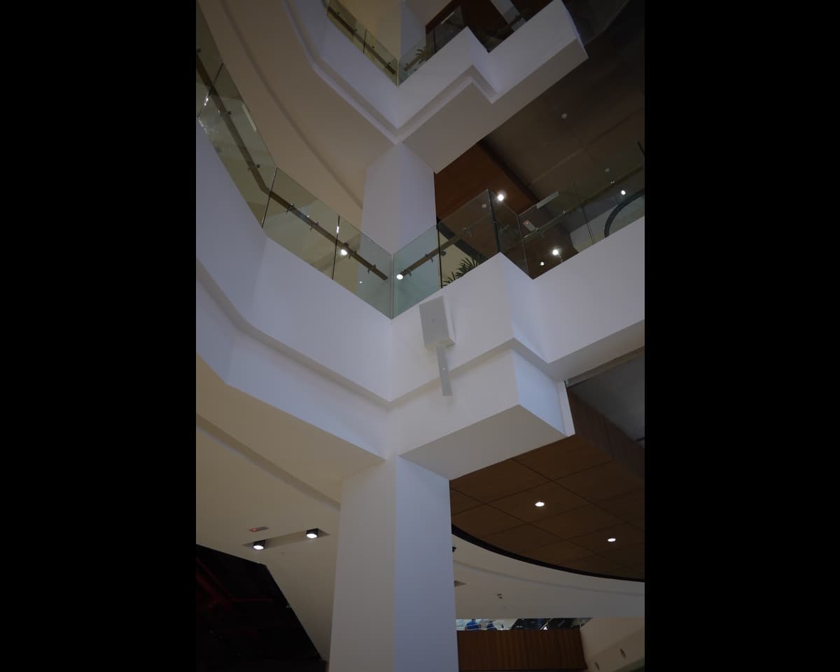 Even tonal balance across walkways and gathering areas so the experience remains cohesive from end to end.