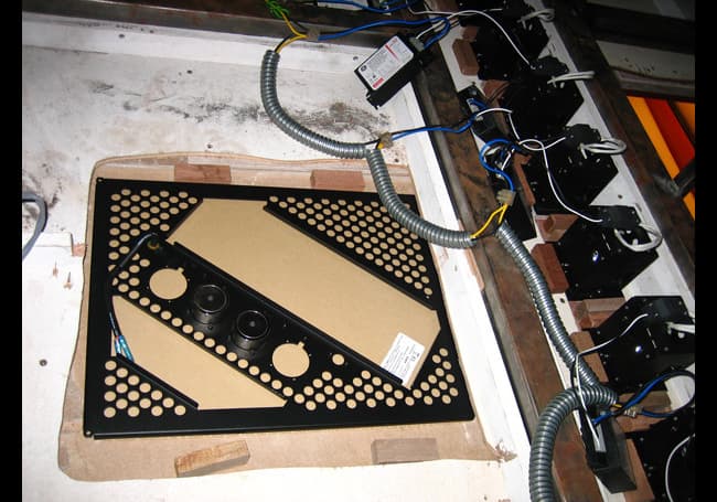 Audio kept visually quiet through careful placement and tuning, preserving the boutique’s clean lines and premium finishes.