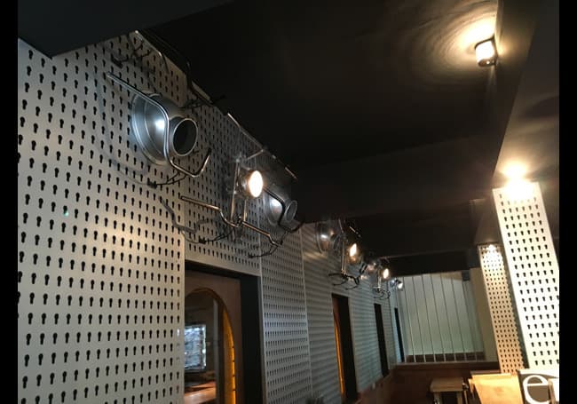 Feature wall and indoor seating zone with slightly lifted levels for a livelier vibe around the bar, while keeping the overall mix smooth and non-fatiguing.