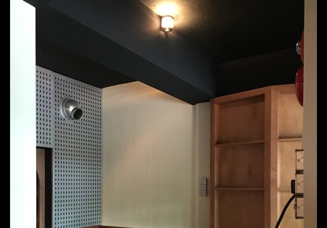 Perimeter tables and corner pockets tuned with softer levels, giving guests space for longer hangs and conversation while still staying inside the overall soundscape.