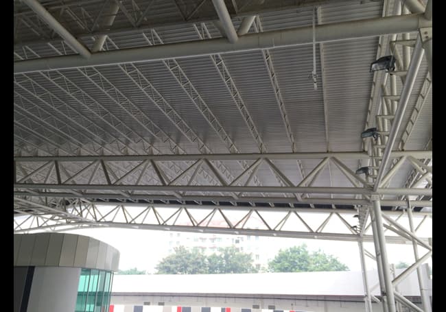 System deployment designed to maintain clarity across large spectator and circulation areas.