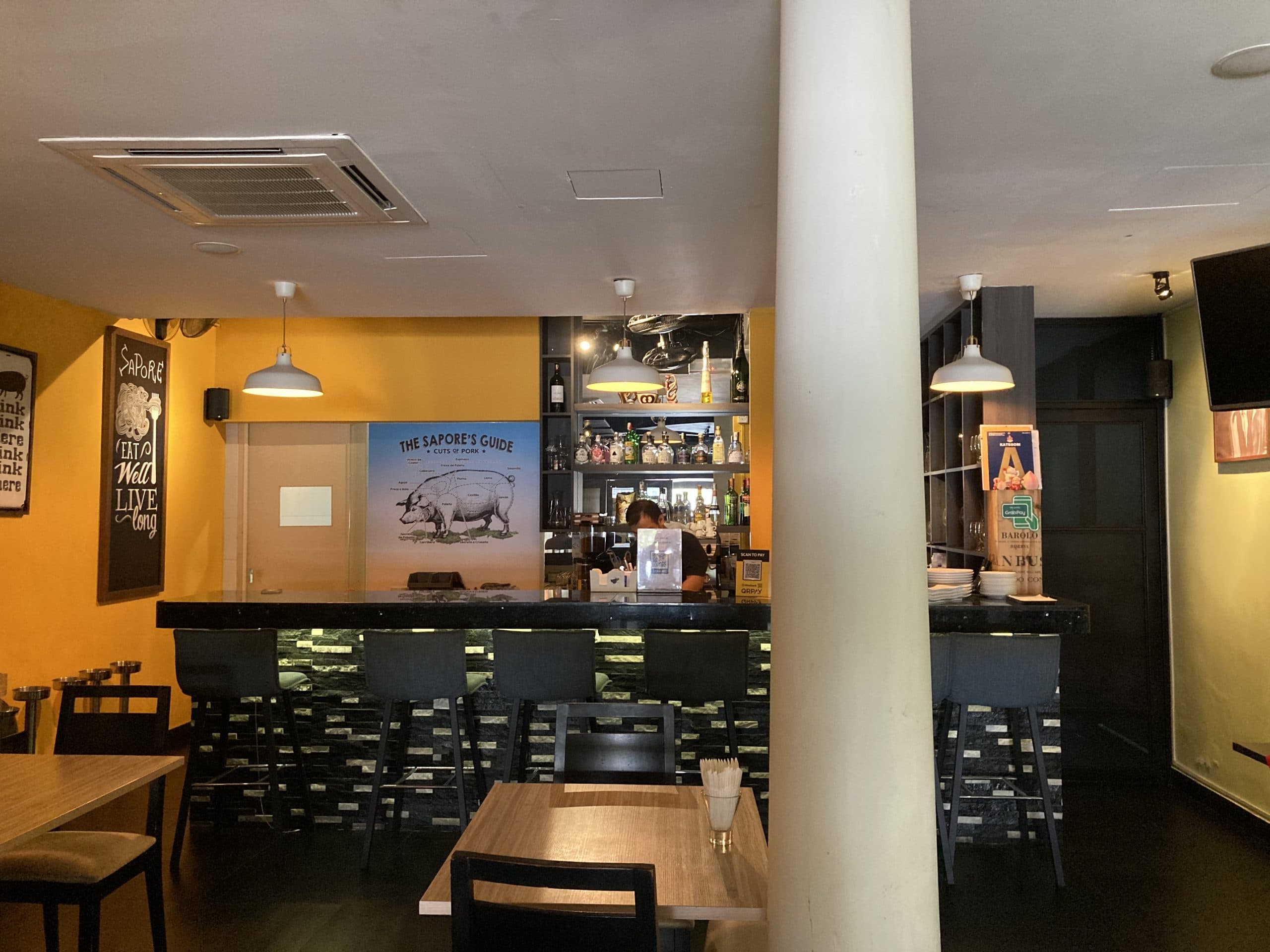 Intimate dining floor with evenly distributed loudspeakers, voiced for clear speech and a gentle musical bed that never overwhelms the table.