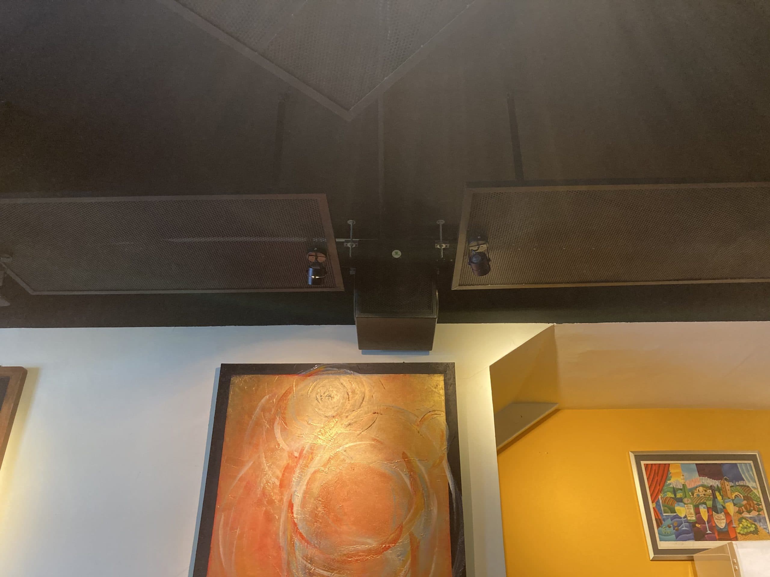 Subtle background audio along circulation paths and service zones, maintaining a continuous soundscape as guests move through the restaurant.