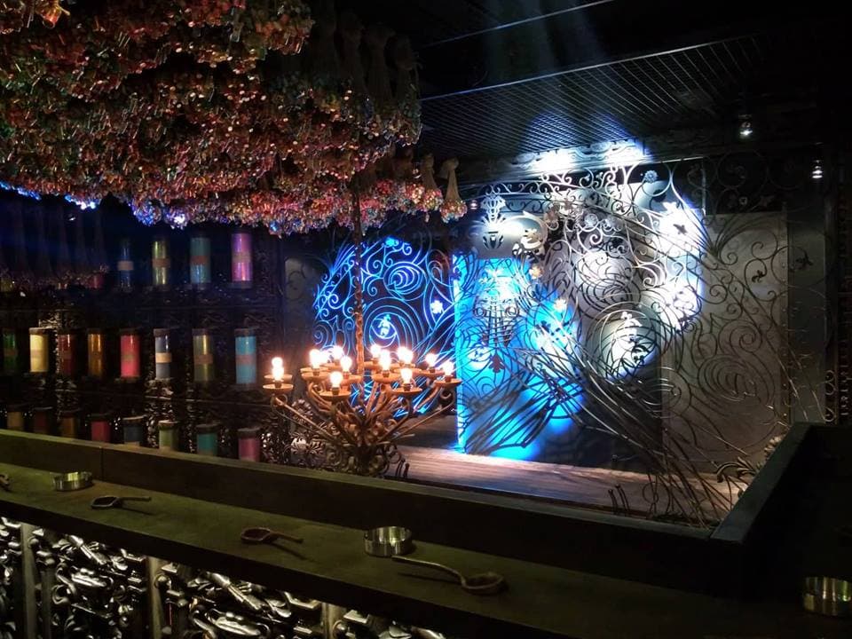 Enclosed Butterfly Room with dense, immersive sound that supports late-night DJ sets while still preserving clarity for vocals and melodic content.